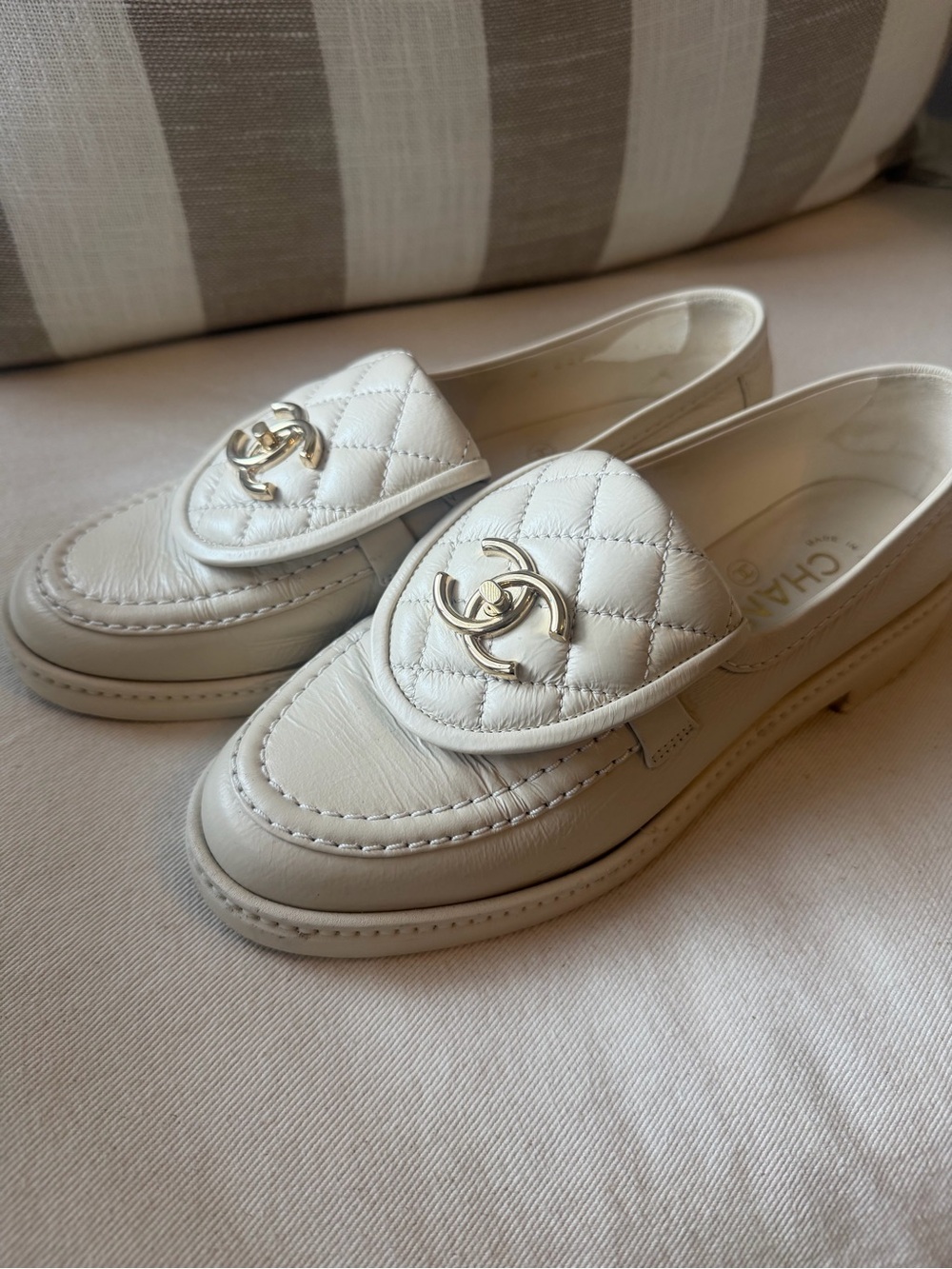CHANEL White Quilted Leather Loafers with Gold CC Emblem